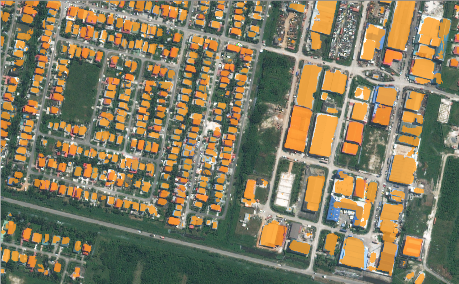 Predictions from a model trained on OSM data (buildings filled in orange) 